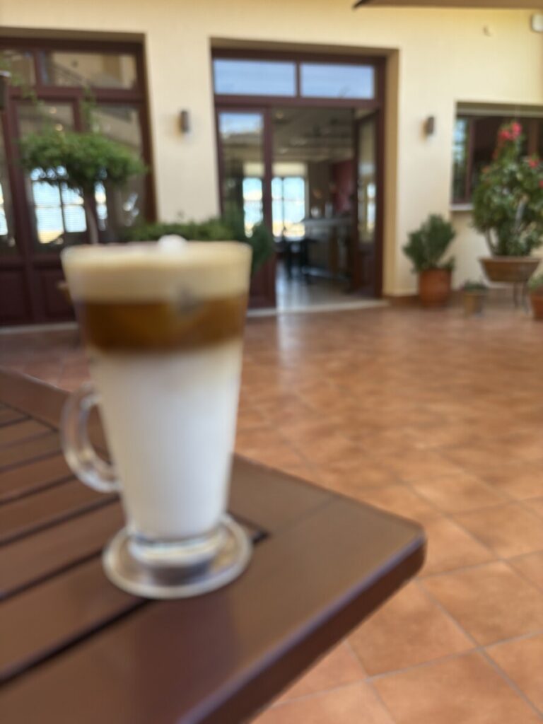 Layered iced coffee on a cafe table