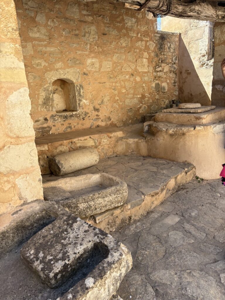Weathered stone room with old carved stone basins